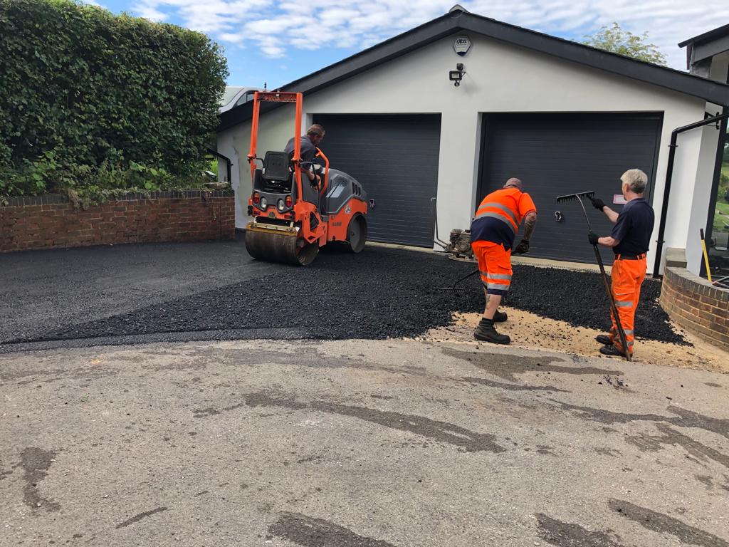 This is a photo of a bitumen driveway which is in the process of being installed by Parkes Road Tek