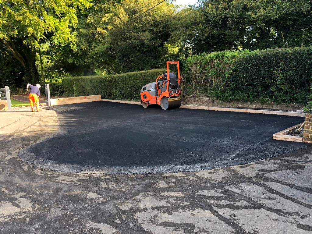 This is a photo of a bitumen driveway which is in the process of being installed by Parkes Road Tek